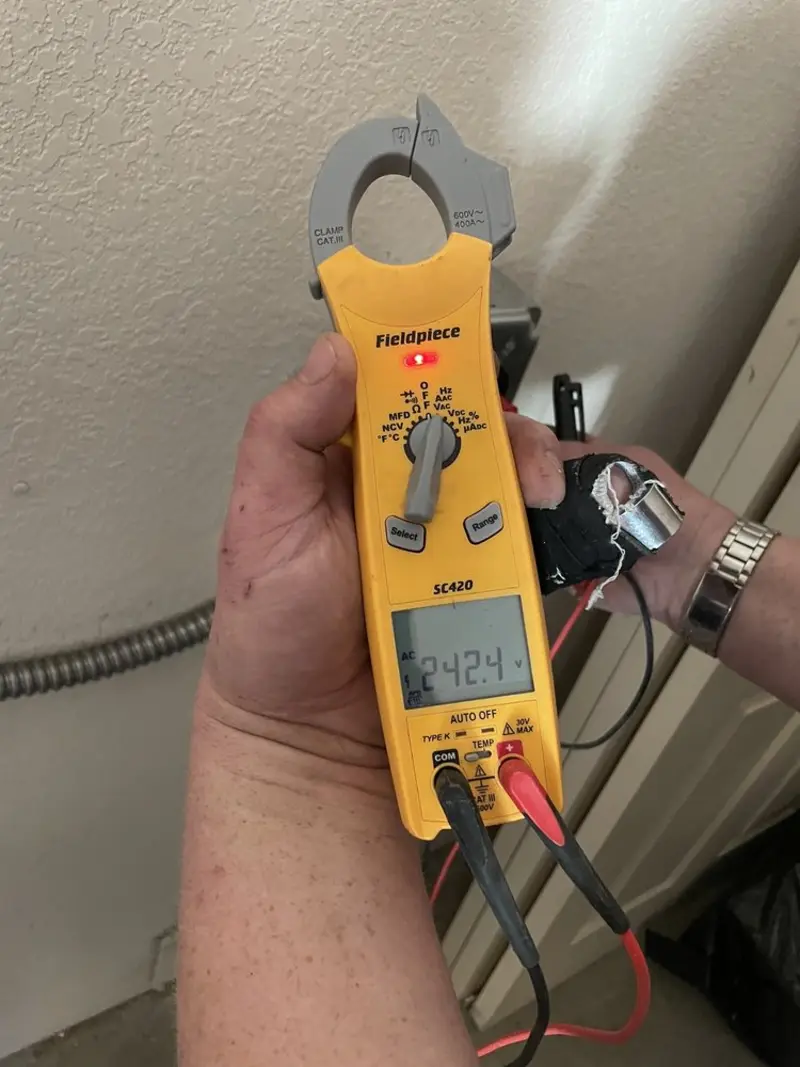 Voltage testing with clamp meter during Electrical Installation Services in Old Town